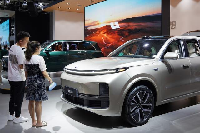 政策利好 车企加码——中国新能源汽车产业按下“加速键缩略图